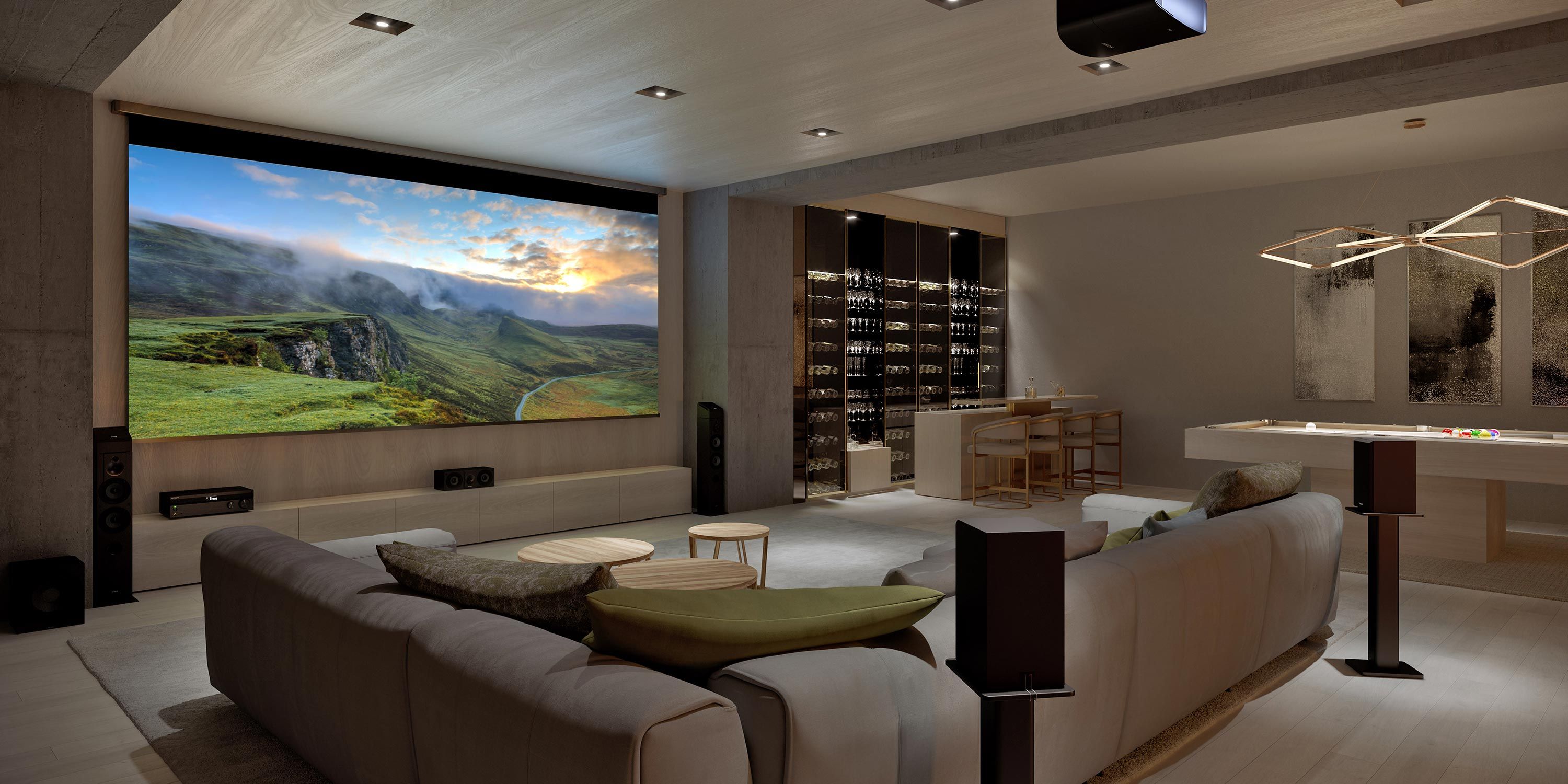 Luxurious home bar and game room with a large screen, wine display, and modern seating area.